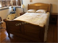 Oak sleigh style queen size bed, with like new