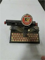Deluxe dial tin toy typewriter