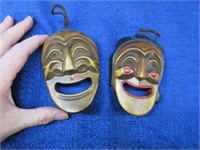 2 miniature hand carved wooden masks