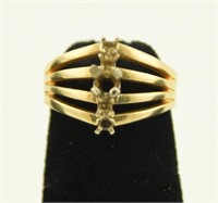 Lot #26 - Ladies 14K yellow gold 4 band tapered