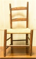 Lot #14 - Primitive rush seat ladderback side