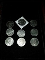 9 Eisenhower dollar coins