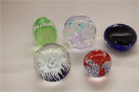 FIVE ASSORTED PAPERWEIGHTS