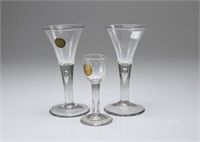 Pair of Georgian wine glasses w/ another