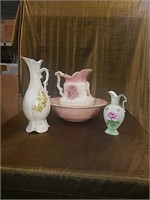 3 antique pitchers and a wash Bowl
