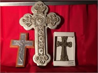 Three decorative crosses