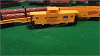 Union pacific caboose with two cars