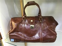 ITALIAN LEATHER DUFFLE WITH ROLLING HANDLE