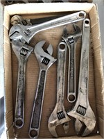 Adjustable wrenches