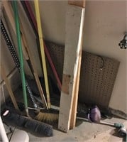 Brooms & Asst Contents in Corner of Garage