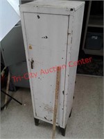 > Vintage metal shelving unit storage cabinet