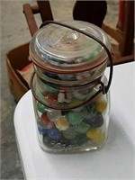 Collection of vintage marble in glass jar