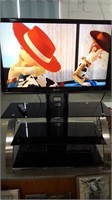 TELEVISION WITH STAND