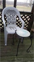 Plastic lawn chair and metal side table