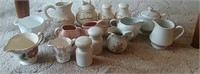 Creamers, salt and peppers, sugar bowls