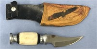Hunting knife with beautiful leather scabbard with