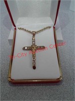 Gold chain with crucifix pendant