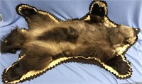 Wolverine mounted rug by Jonas Brothers  about 40"
