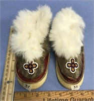 Pair of sealskin and ugruk hide shoes, 7" long