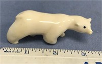3" Carved ivory bear with inset baleen eyes