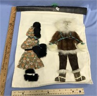 Cloth and baleen and fur wall hanging, top is scri
