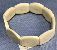 Ivory bracelet with walrus tooth sections