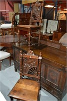 Pair of antique carved elm hall chairs,