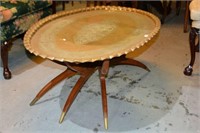 Large hand beaten brass tea table,
