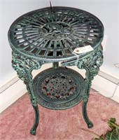 Cast metal green painted and decorated
