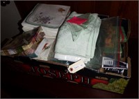 Box of table linens and napkins