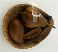 Carved stone bowl with wooden carved fruit