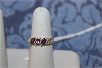 STERLING RING WITH PURPLE STONES