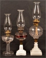 Three Antique Pattern Glass Fluid Lamps.