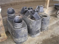 PILE OF FEED PAILS & HOLDERS