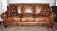 Love Seat in Leather Like Upholstery