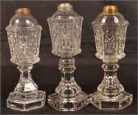 Three Antique Colorless Glass Fluid Lamps.