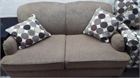 Green Loveseat with accent pillows