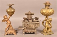 Two Cherub Lamps and "Prize" Toy Stove.