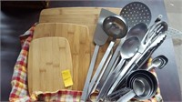 Kitchen serving utensils and  wood serving boards
