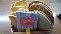 Basket of dish cloths, trivets and book