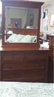 Dresser with mirror and 5 drawers.