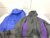 Two new Coleman rain jackets size medium