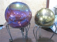 2 yard art colored globes on stands