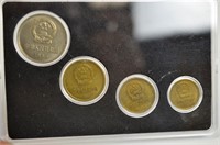 Four Chinese Coins in Case