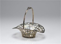 American Marcus and Co. silver swing handle basket