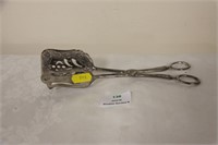 Silver cakes tongs, marked 800.90g.