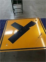 Yellow and black metal sign