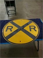 Railroad yellow and black metal sign