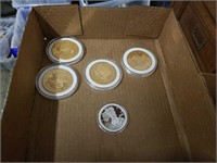 Box of Gold clad coins and one silver clad coin