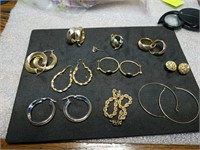 10 pairs of gold earrings marked 14K and one